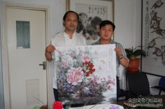 著名画家李贵富为《艺术天成》杂志社留墨