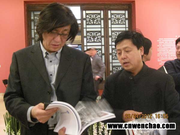 《艺术天成》总编杨文超与中国美术家协会理事马书林合影