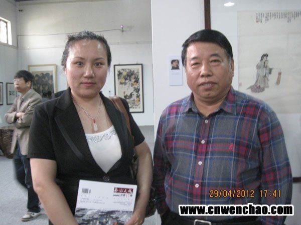 国家一级美术师、中国艺术研究院中国美术创作院副院长满维起与艺术天成杂志社通联部主任宁文艳合影