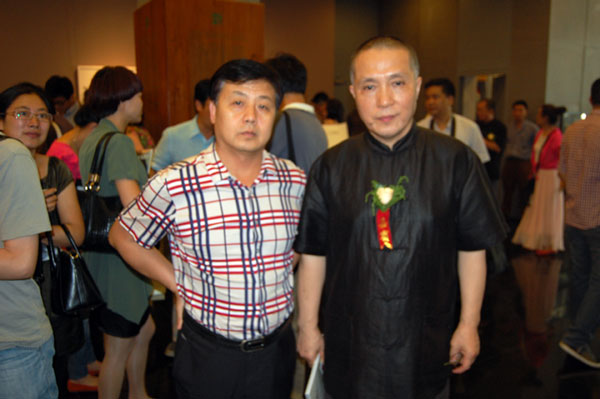 著名画家周京新与总编杨文超合影