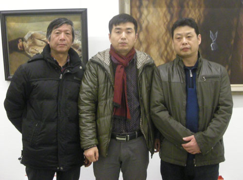 中国书画家协会理事、国家一级美术师马治富(右)、林少云(中)、画家王长江(左)合影