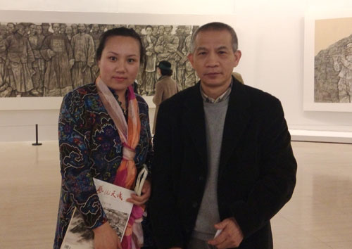 画展主人赵奇与《艺术天成》杂志社通联部主任宁文艳合影