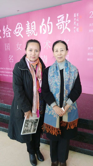 女画家协会主席孔紫与宁文艳合影